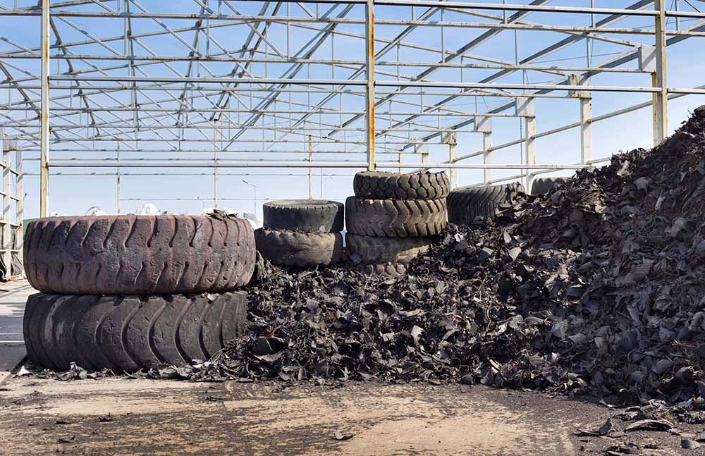 Close,Up,Of,Old,Used,Tires,And,Shredded,Tire,Pile